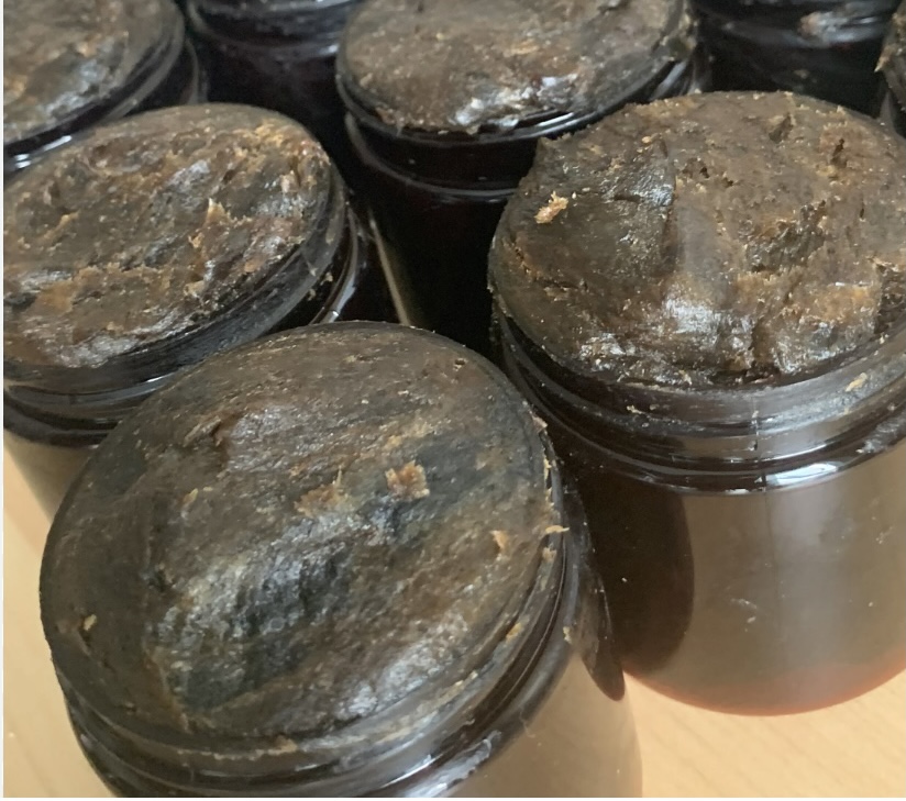Raw African Black Soap Paste – Deep-cleansing, natural skincare for acne, dark spots, and eczema, handcrafted in Ghana.